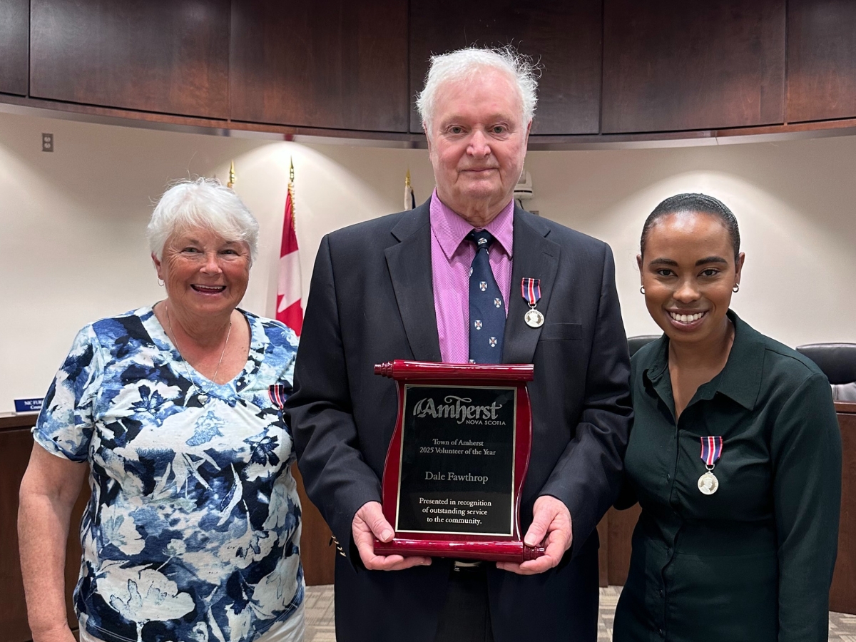 Photo of Bonnie Quinn, Dale Fawthrop, and Nayo Upshaw - all recipients of a King Charles the Third Medal in 2025.