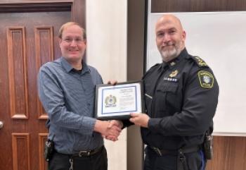 Recognizing Inspector Tom Wood